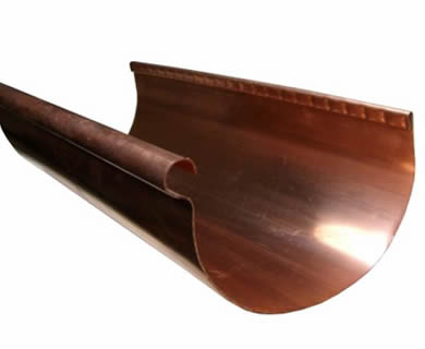 An half round copper gutter on the white background.