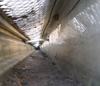 The inside of gutter which is covered by micro mesh gutter guard.